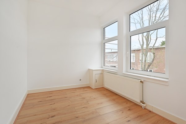 Medium property photo - Deimanstraat 309, 2522 BK Den Haag